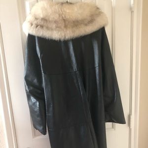 Leather coat with fur collar.